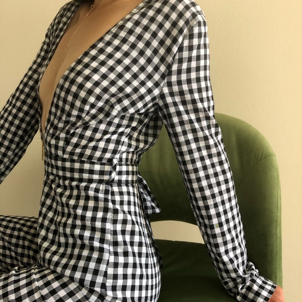 Checkered jumpsuit with plunging neckline